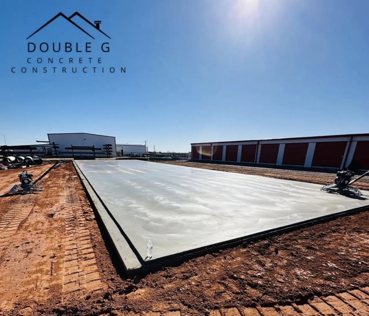 Large commercial concrete slab pour at a storage facility by Double G Concrete Construction