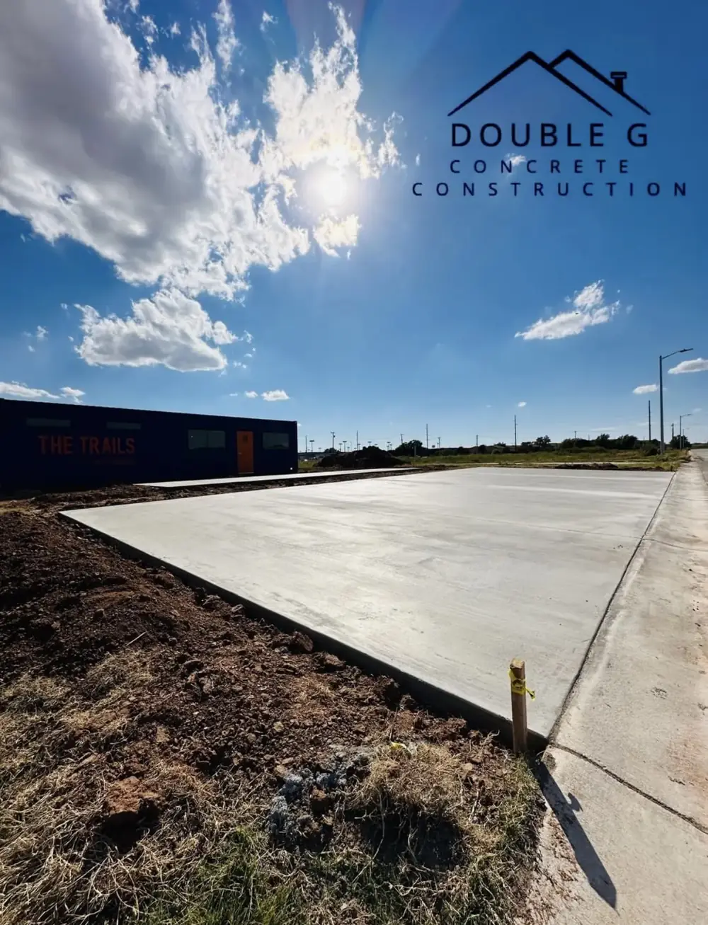 Prepared and poured concrete slab on a graded site by Double G Concrete Construction